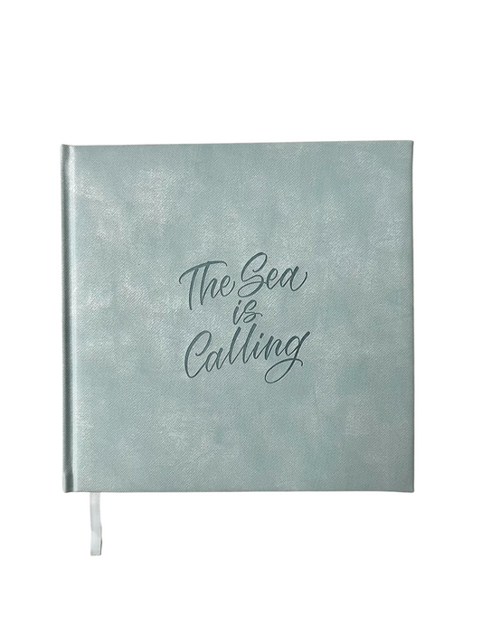 Profile of The Sea is Calling square journal, blue vegan leather with lettering on cover