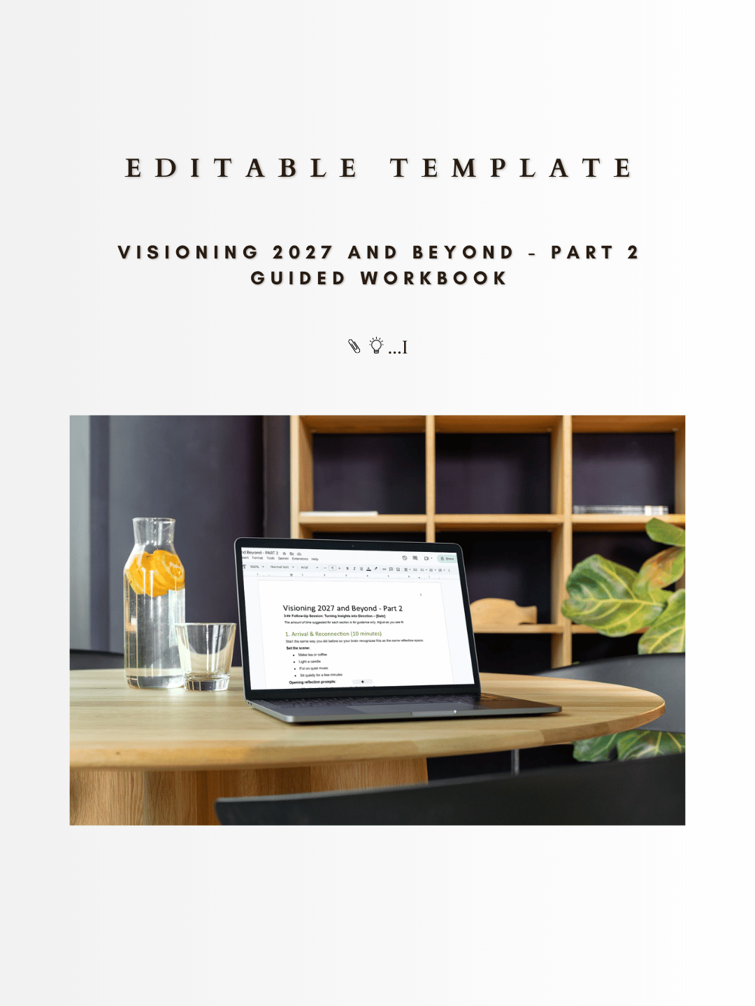 Visioning workbook on a laptop on a round wooden table