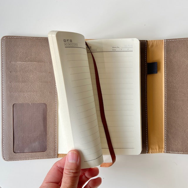 Personal Folio in brown, with card slots, pockets, pen loop and small notebook for on the go notes